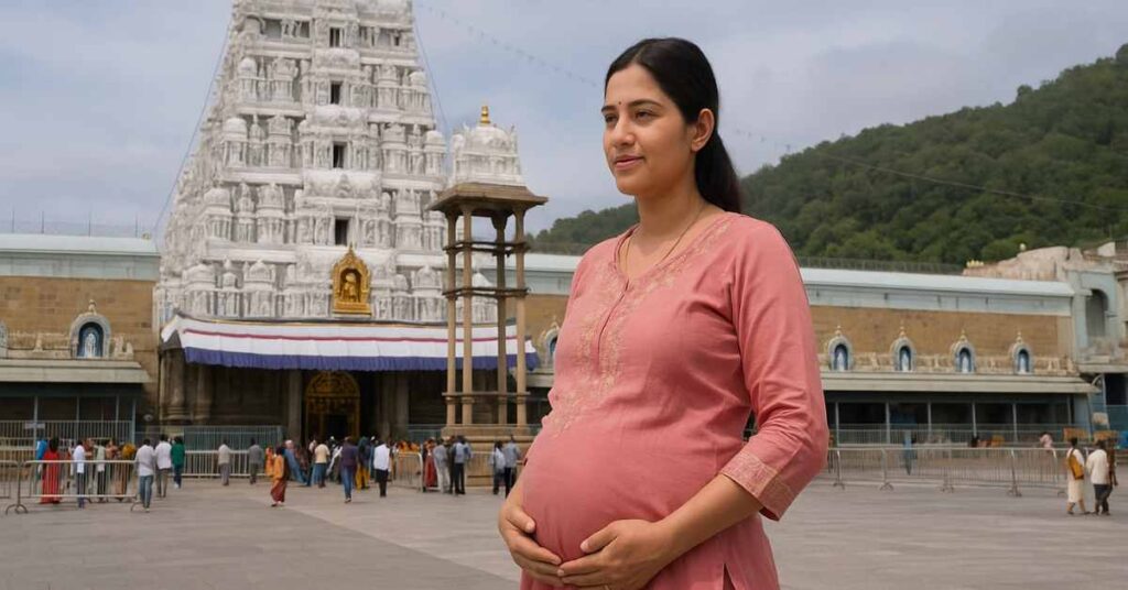 Pregnant woman standing in front of Tirumala Venkateswara Temple
