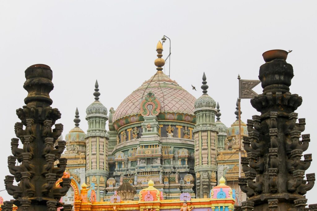 Khandoba Temple Darshan Pooja devotees climbing steps with turmeric dust